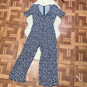 Reformation Jumpsuit blue with white flowers.